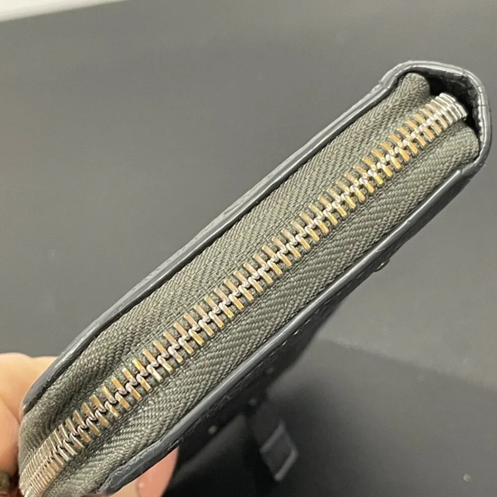 Louis Vuitton Zippy Wallet Monogram Empreinte Leather with Silver Studs (JB1040)
